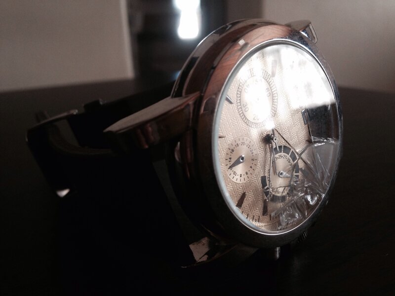 Broken Watch on Table