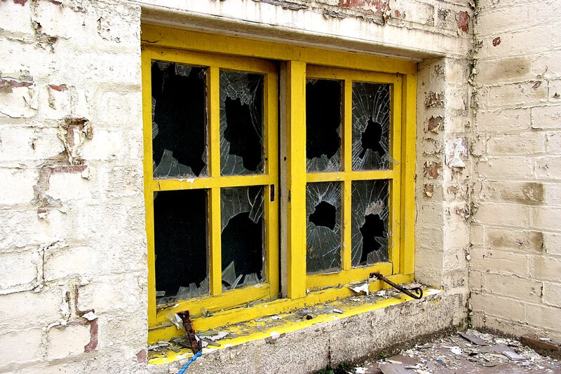 broken window in abandoned building