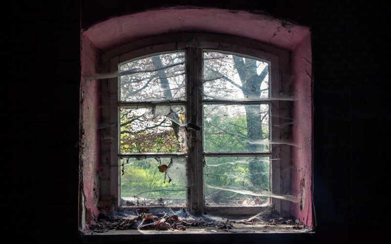 Broken Window in Abandoned Building — Pink