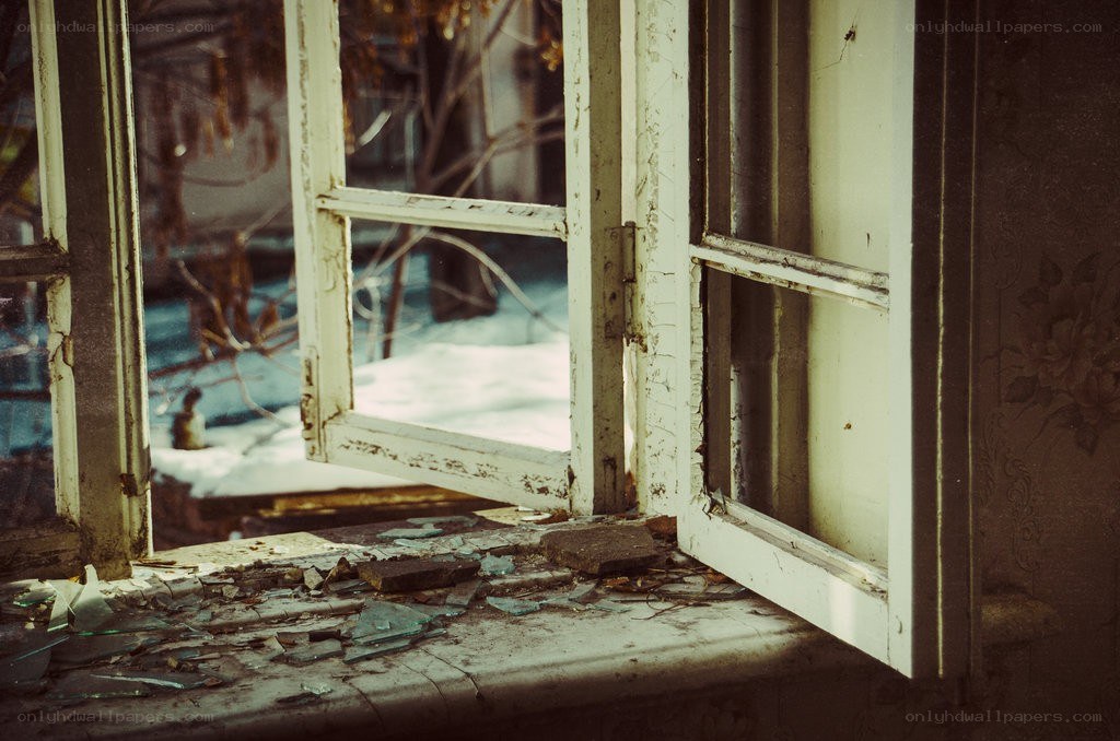 broken window in abandoned house