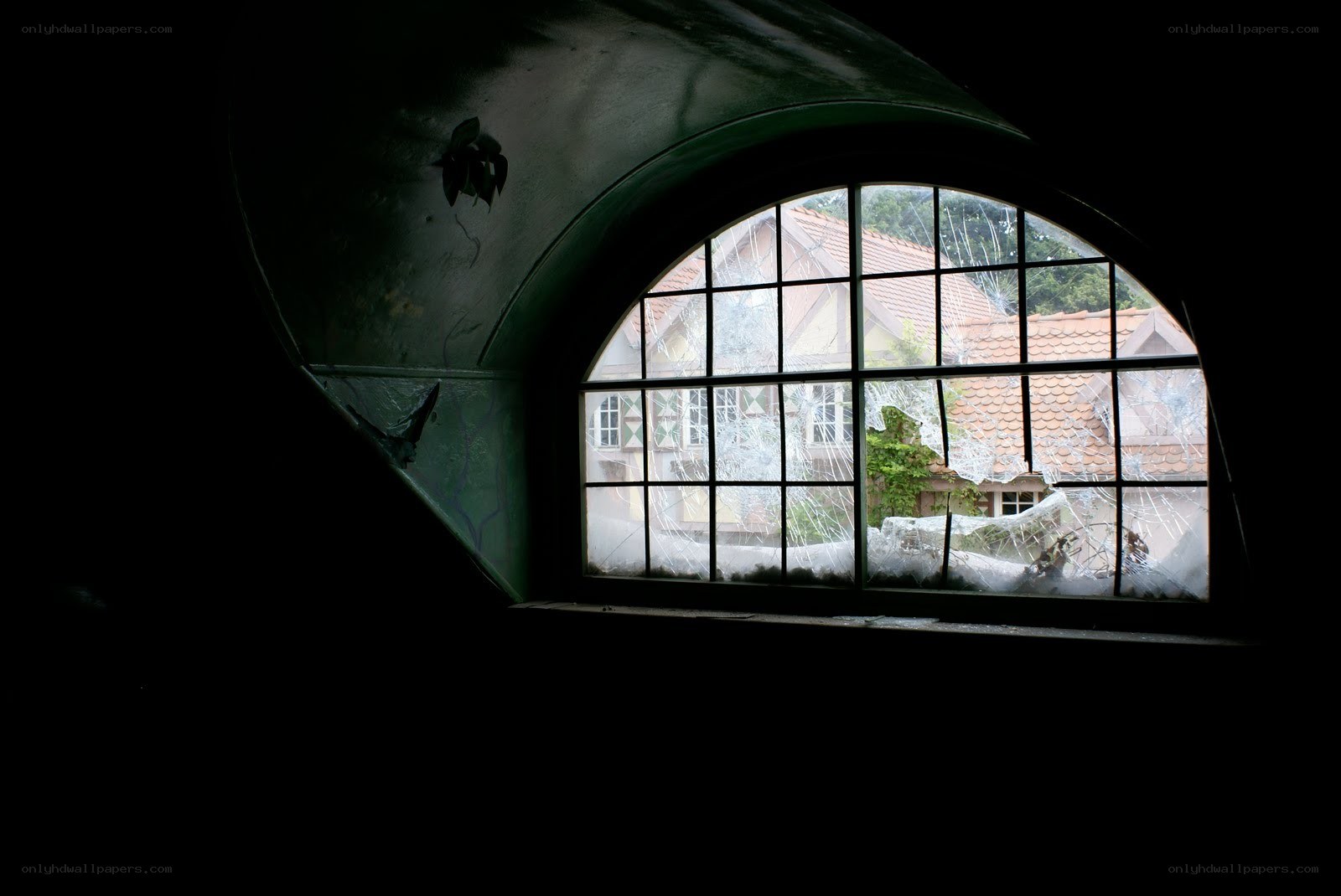 Broken window view of a house