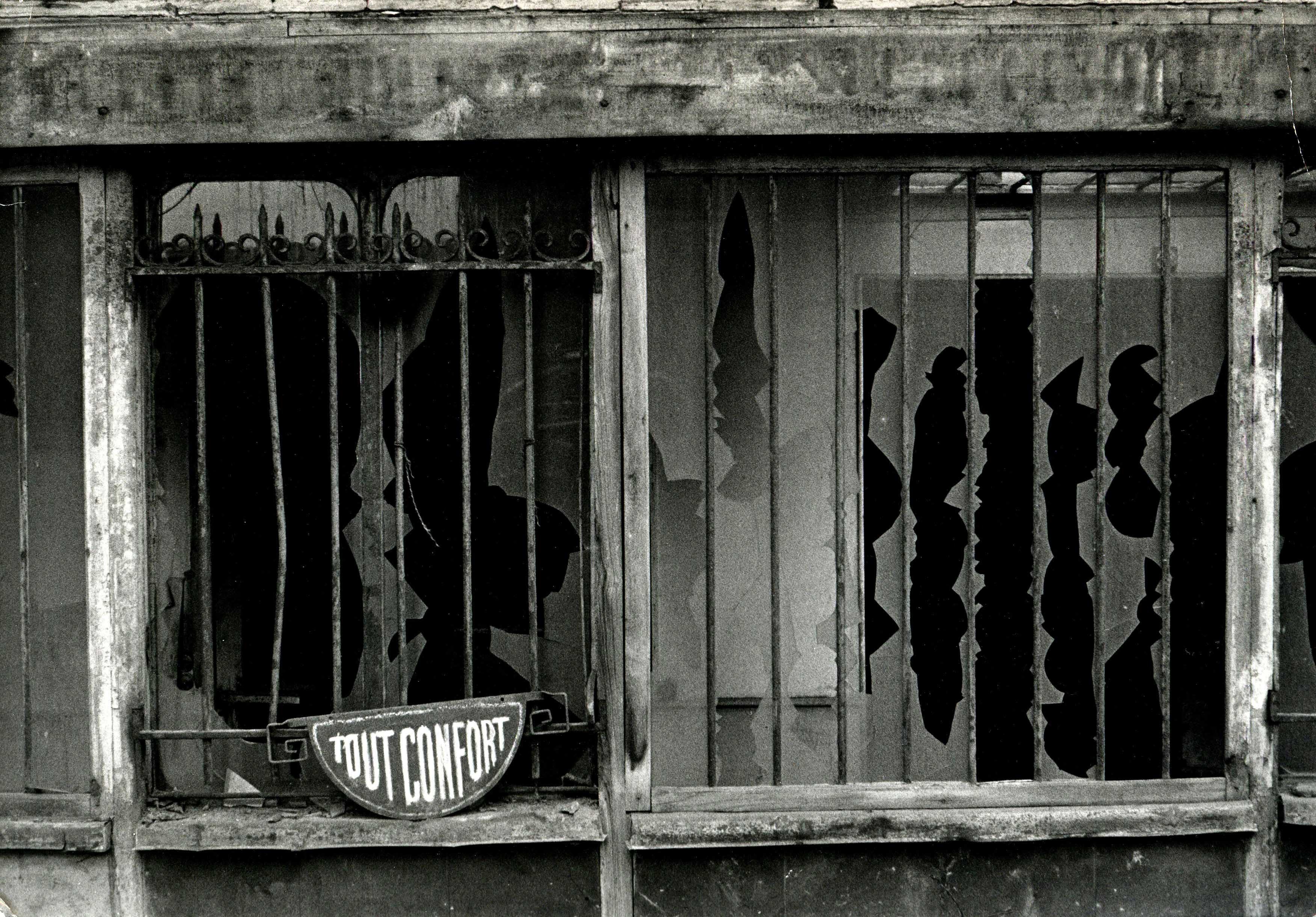 Broken window with sign