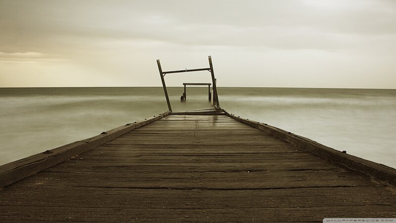 Broken Wooden Pier — Brown