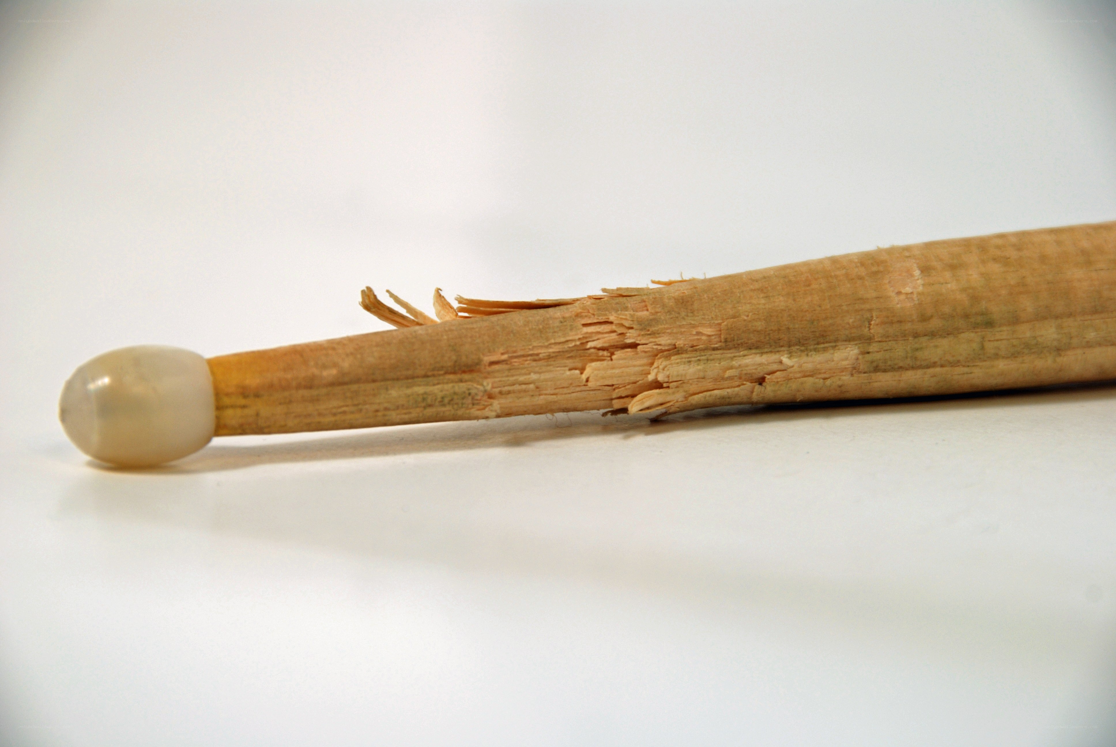 broken wooden stick with stone tip