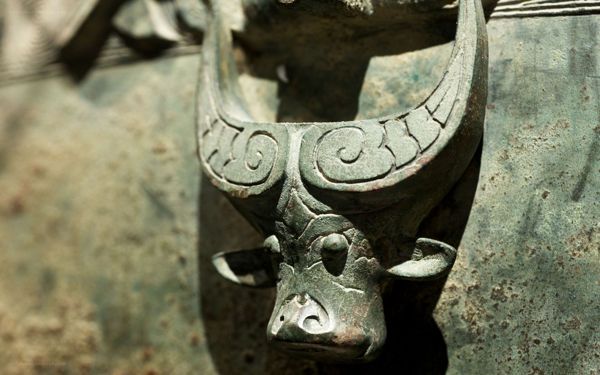 Bronze bull head sculpture