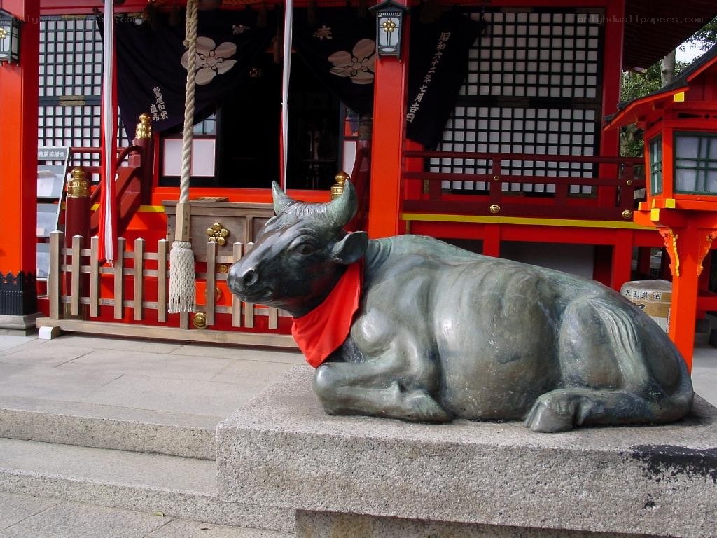 Bronze bull statue at shrine