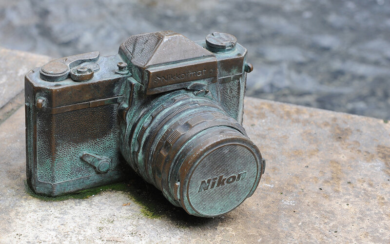 bronze camera statue