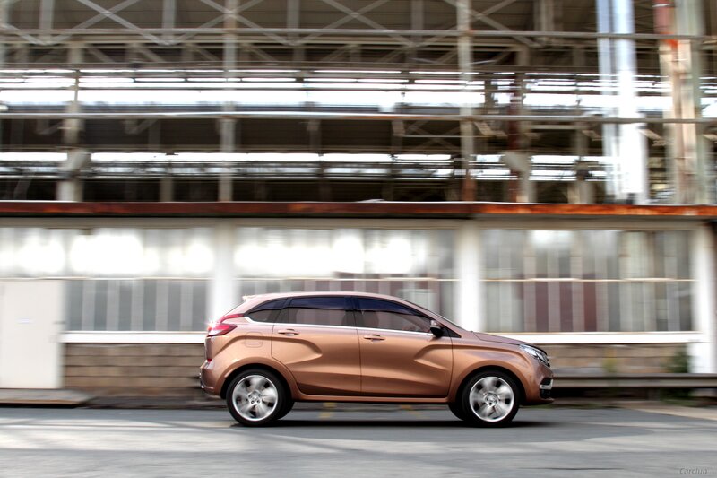 Bronze Car in Motion