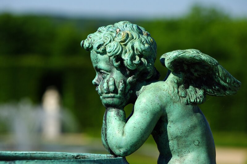 bronze cherub statue