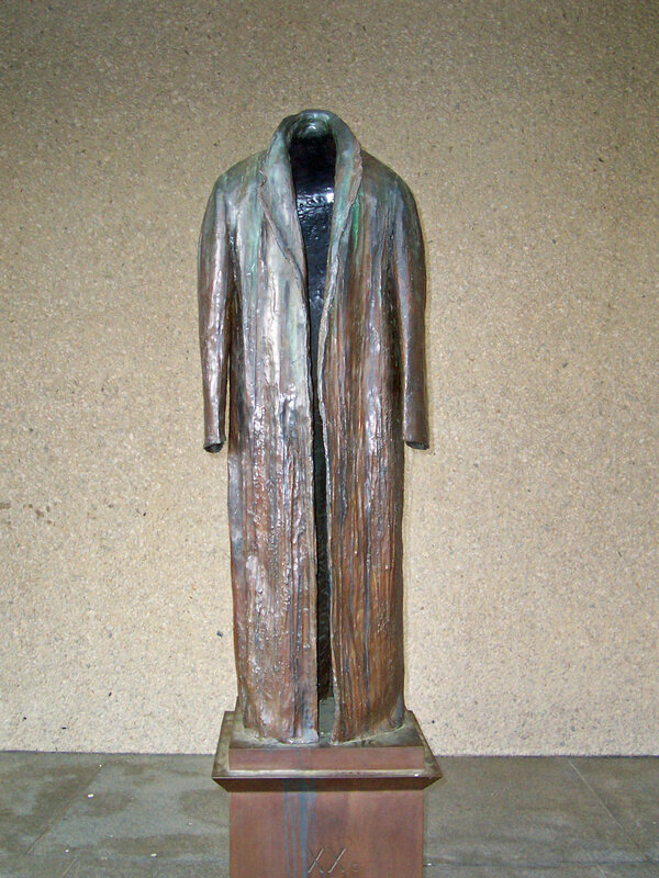 Bronze coat sculpture