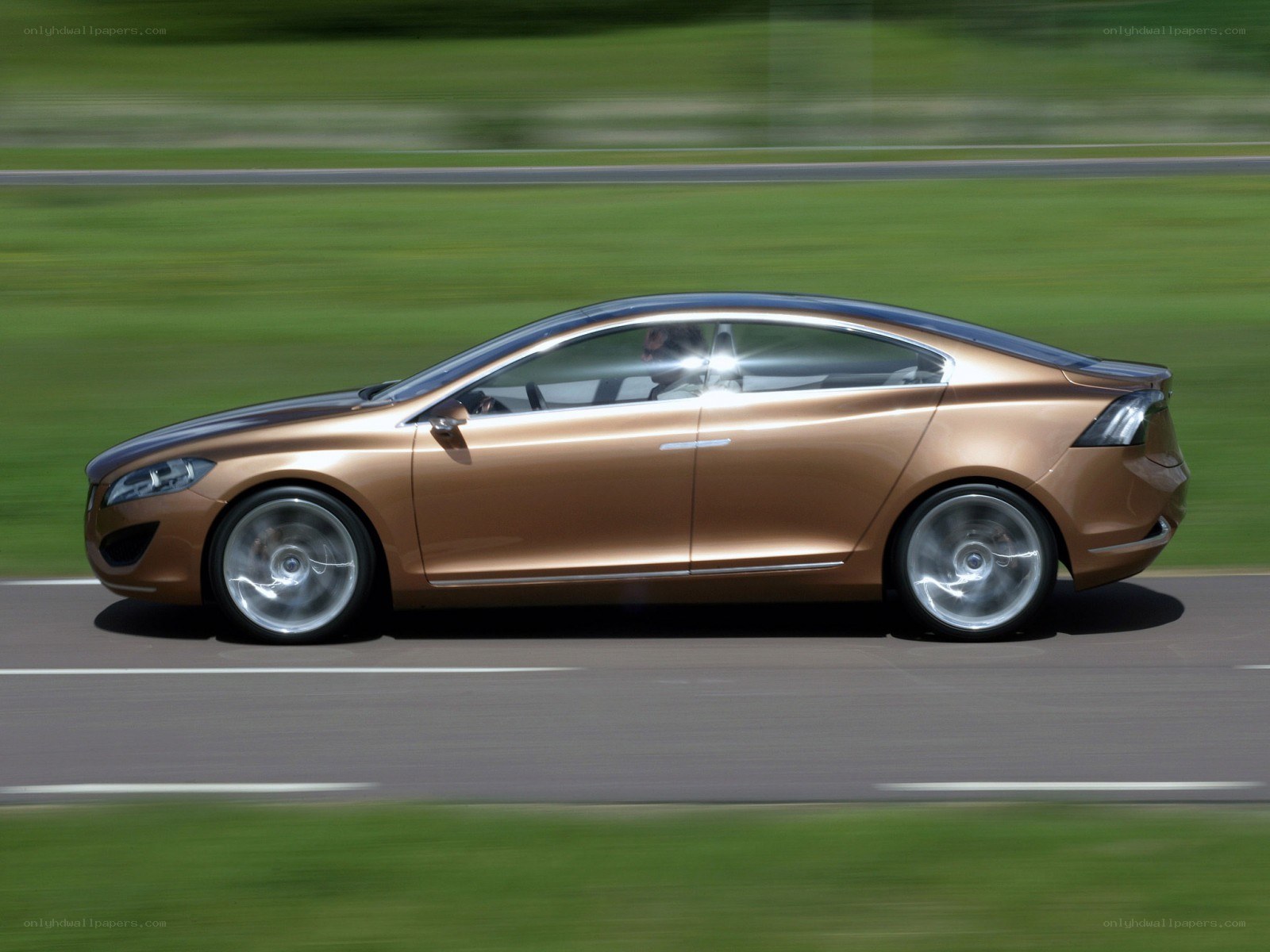bronze concept car in motion