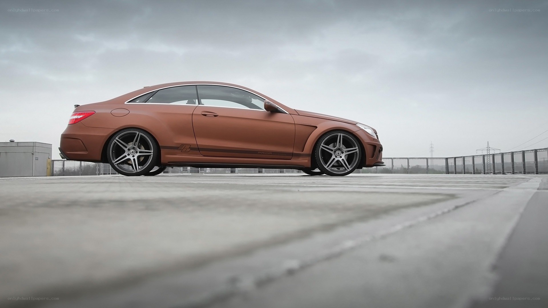 bronze coupe on rooftop