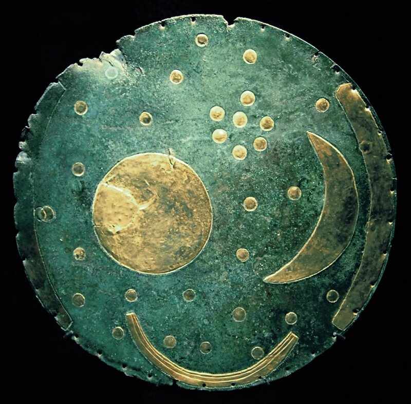 Bronze disc with gold inlays