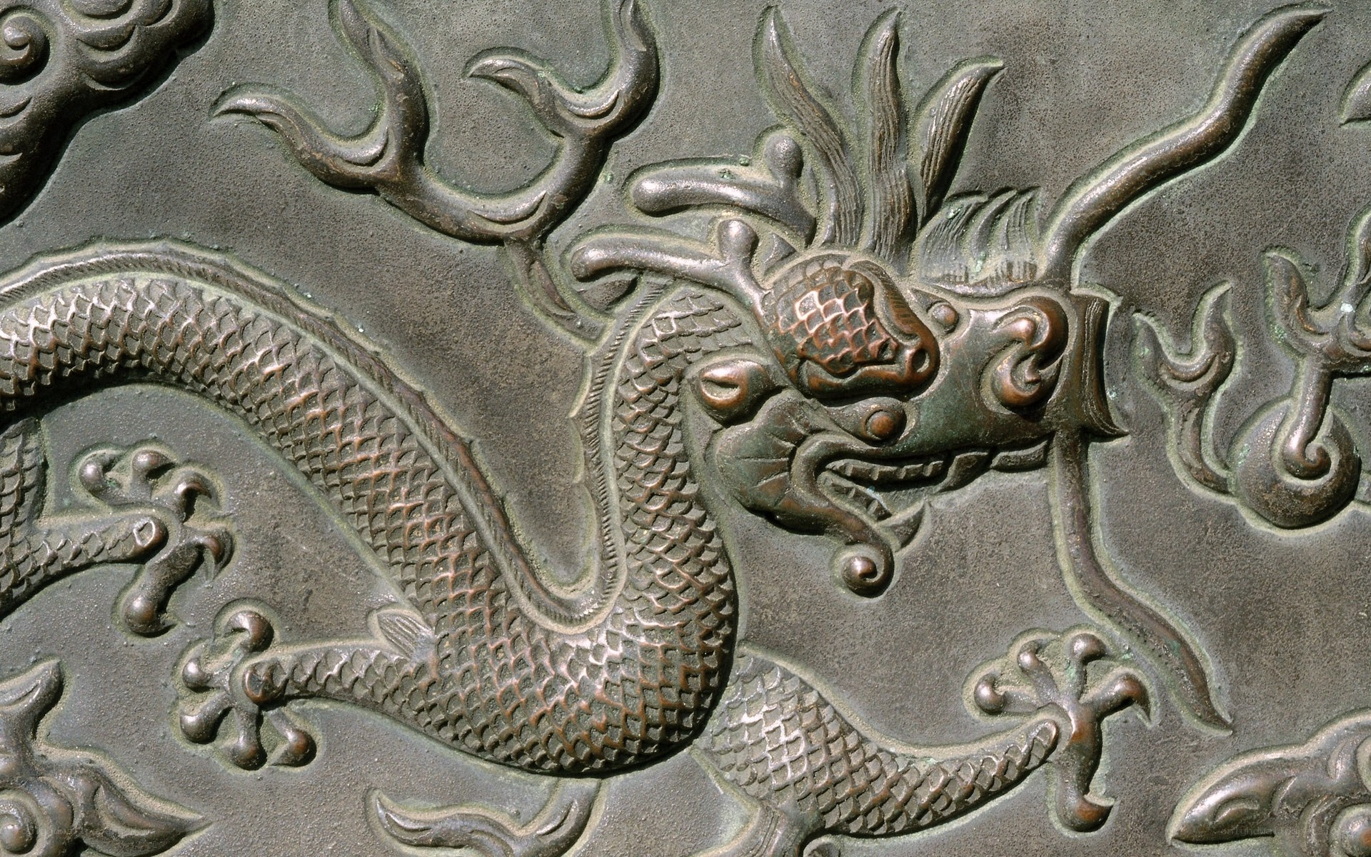 Bronze dragon relief carving