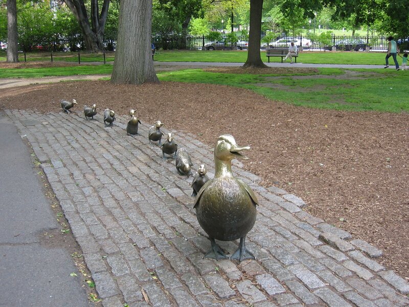 Bronze duck sculpture in park