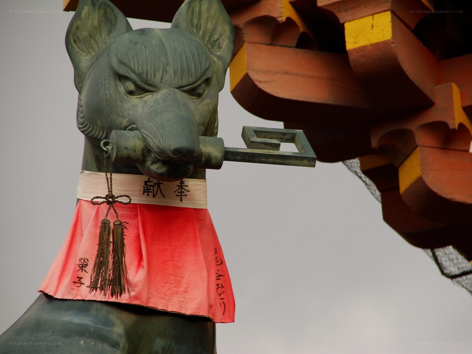 bronze fox statue at shrine