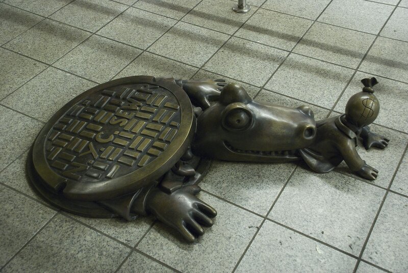 Bronze sculpture of a crocodile