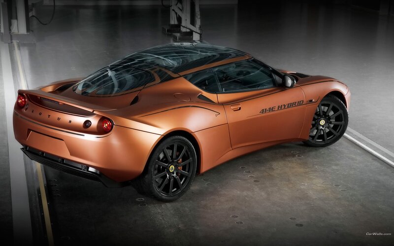 Bronze Sports Car — Dramatic, Photograph, Garage, Black Wheels, Black