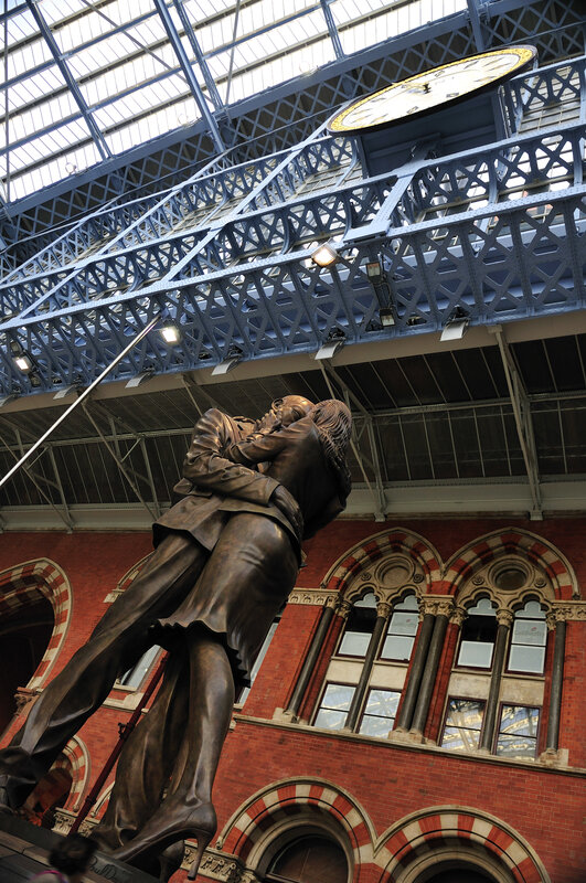 Bronze statue at train station