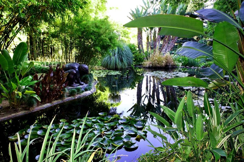 Bronze Statue by Pond