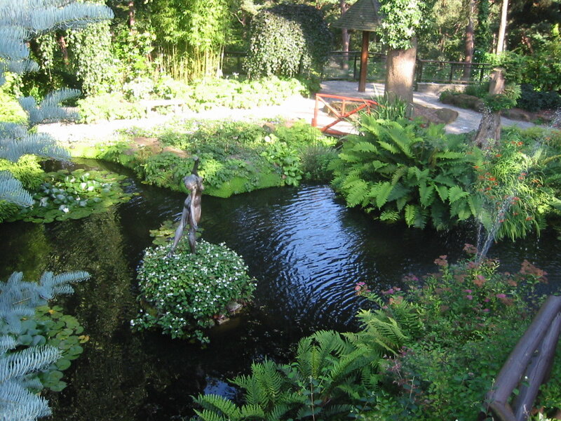 Bronze Statue in Pond