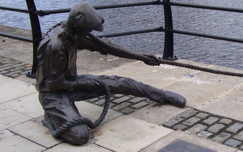 bronze statue of dockworker