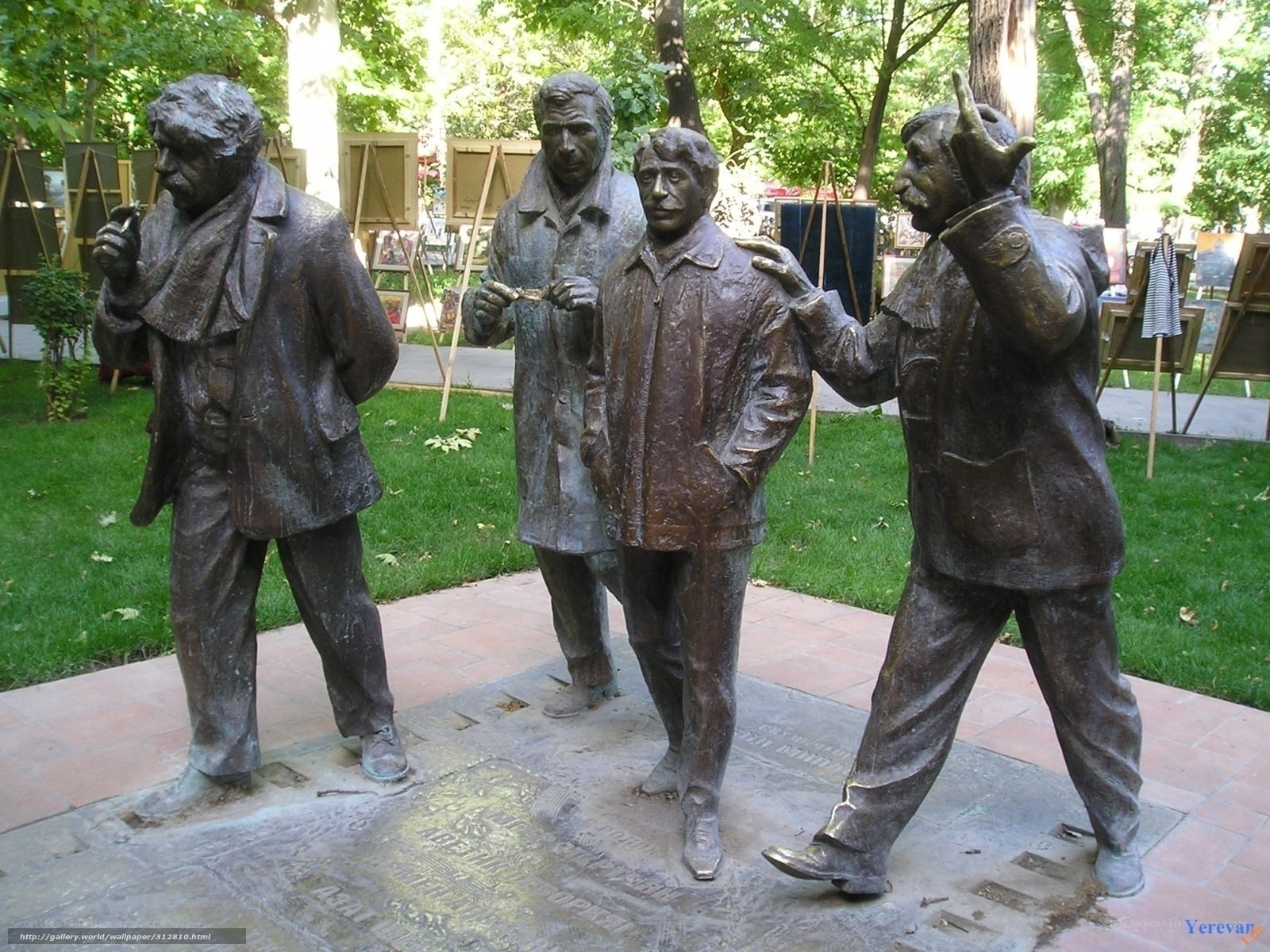 Bronze statue of four men