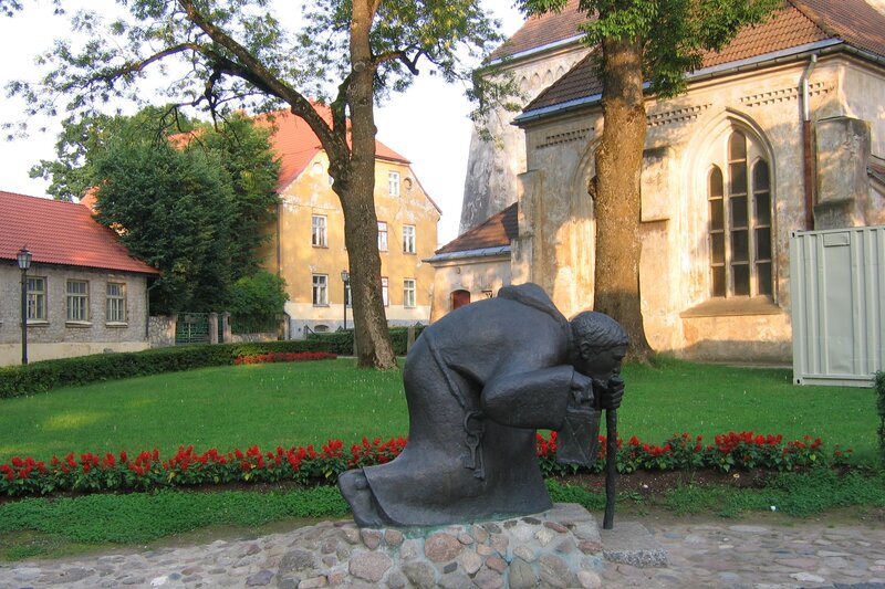 Bronze Statue of Kneeling Man