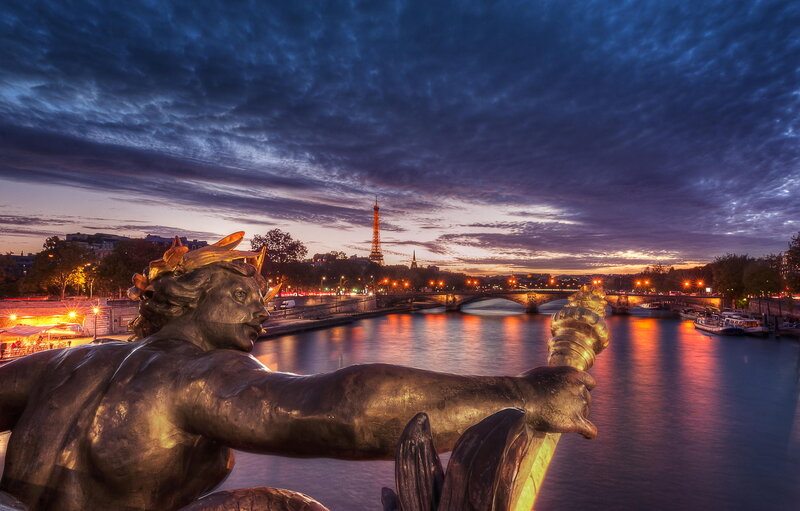 Bronze Statue on Riverbank