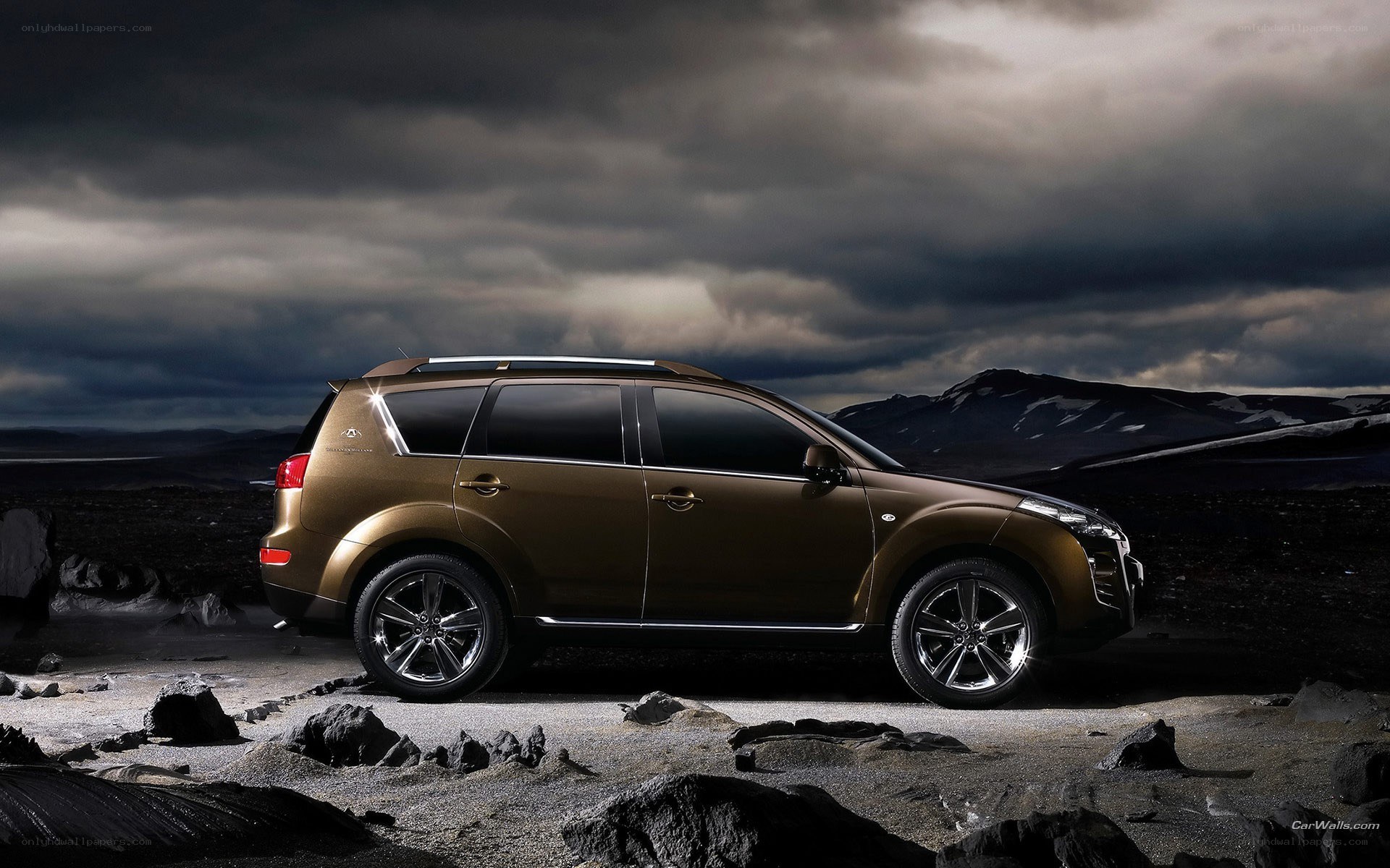 Bronze SUV in rugged landscape