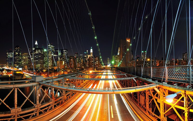 Brooklyn Bridge at Night — Dramatic, Light Trails