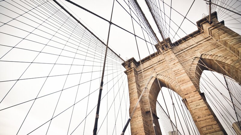 Brooklyn Bridge Tower — Gray, Dramatic, Photograph