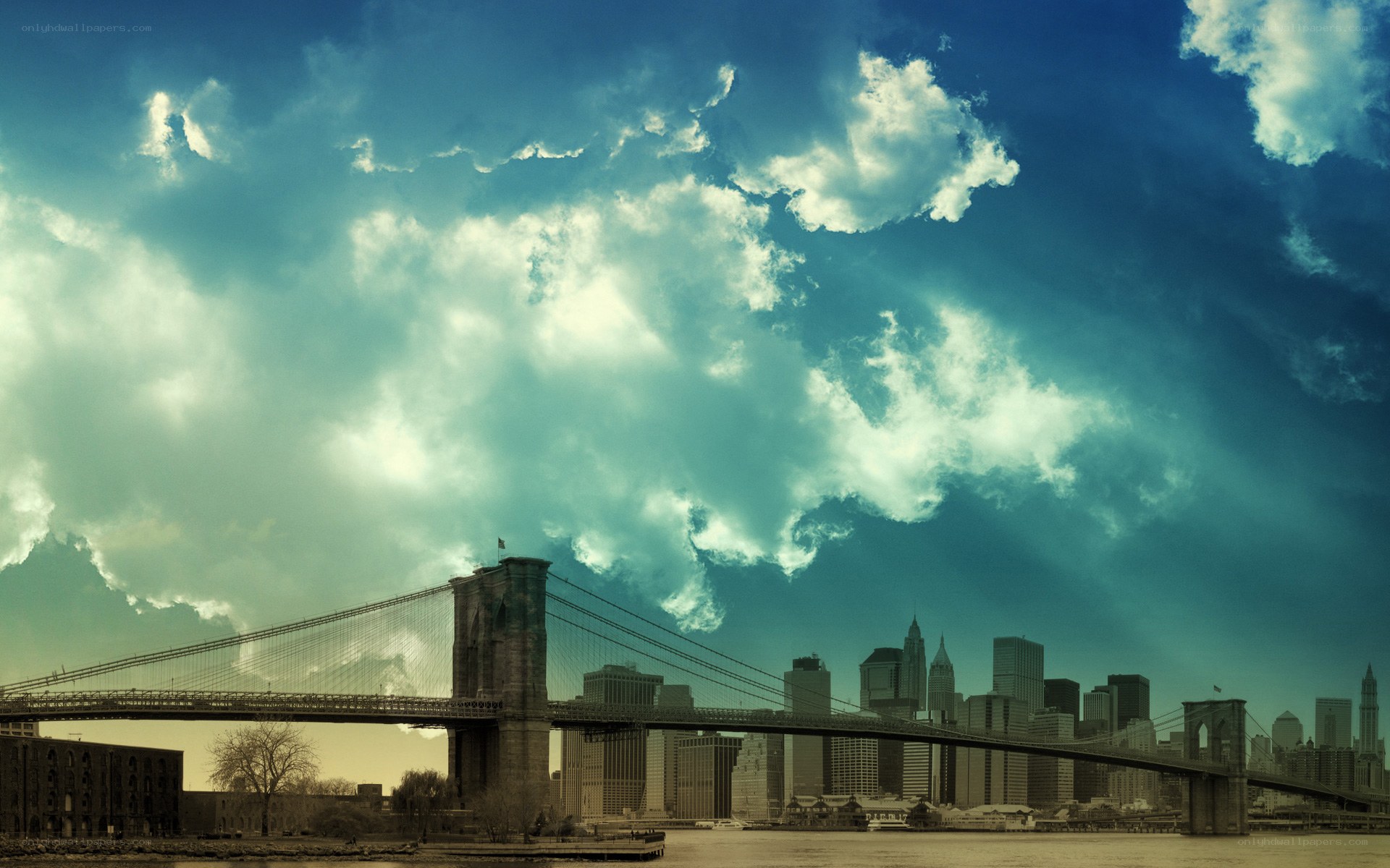 Brooklyn Bridge under dramatic sky