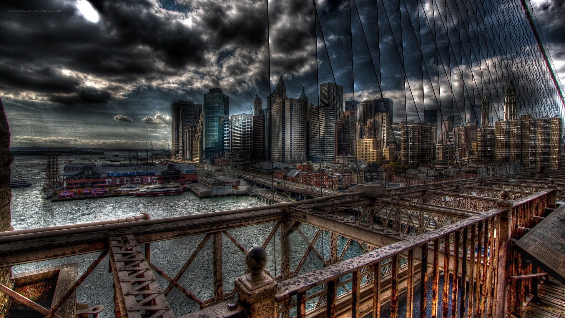 Brooklyn Bridge under stormy sky