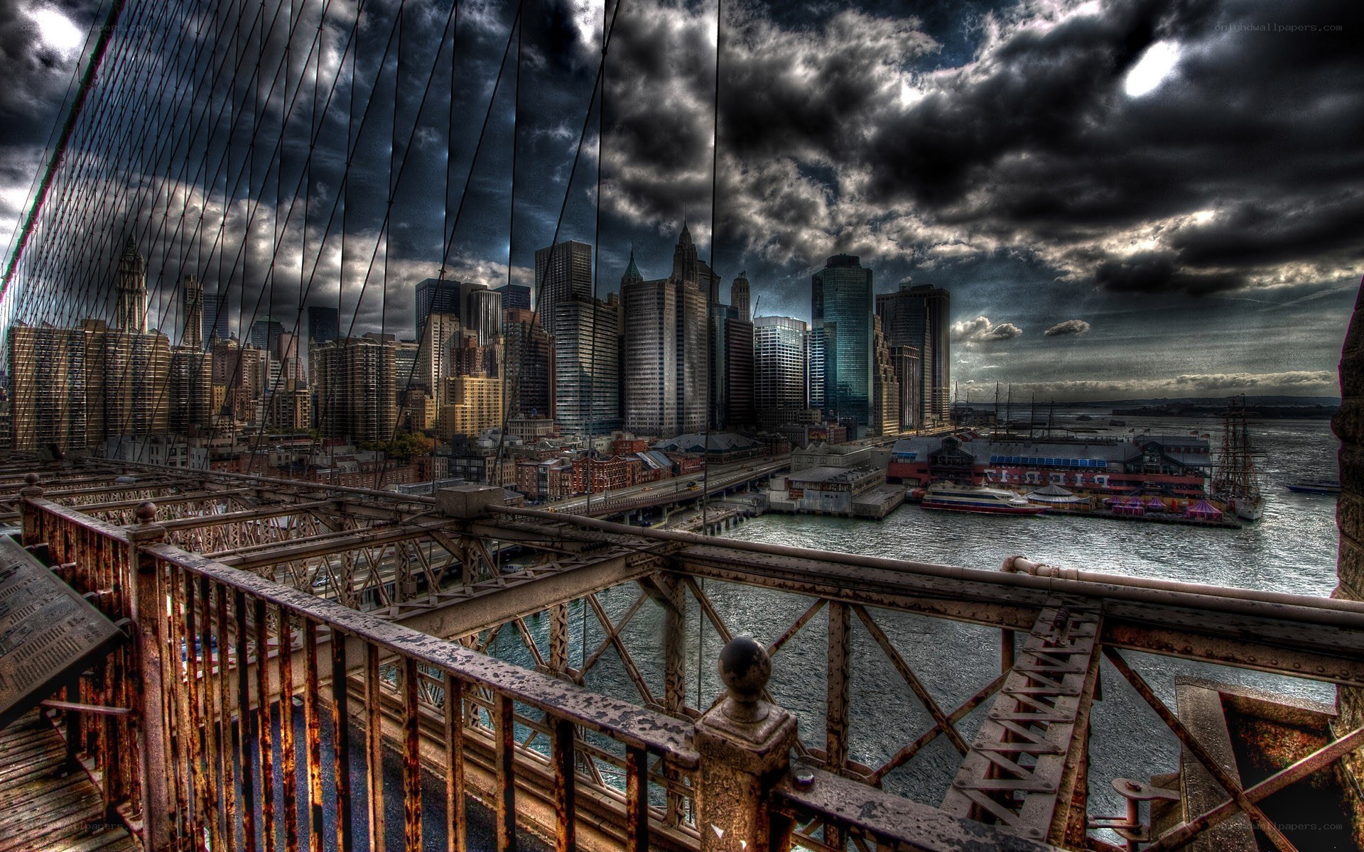 Brooklyn Bridge under stormy sky