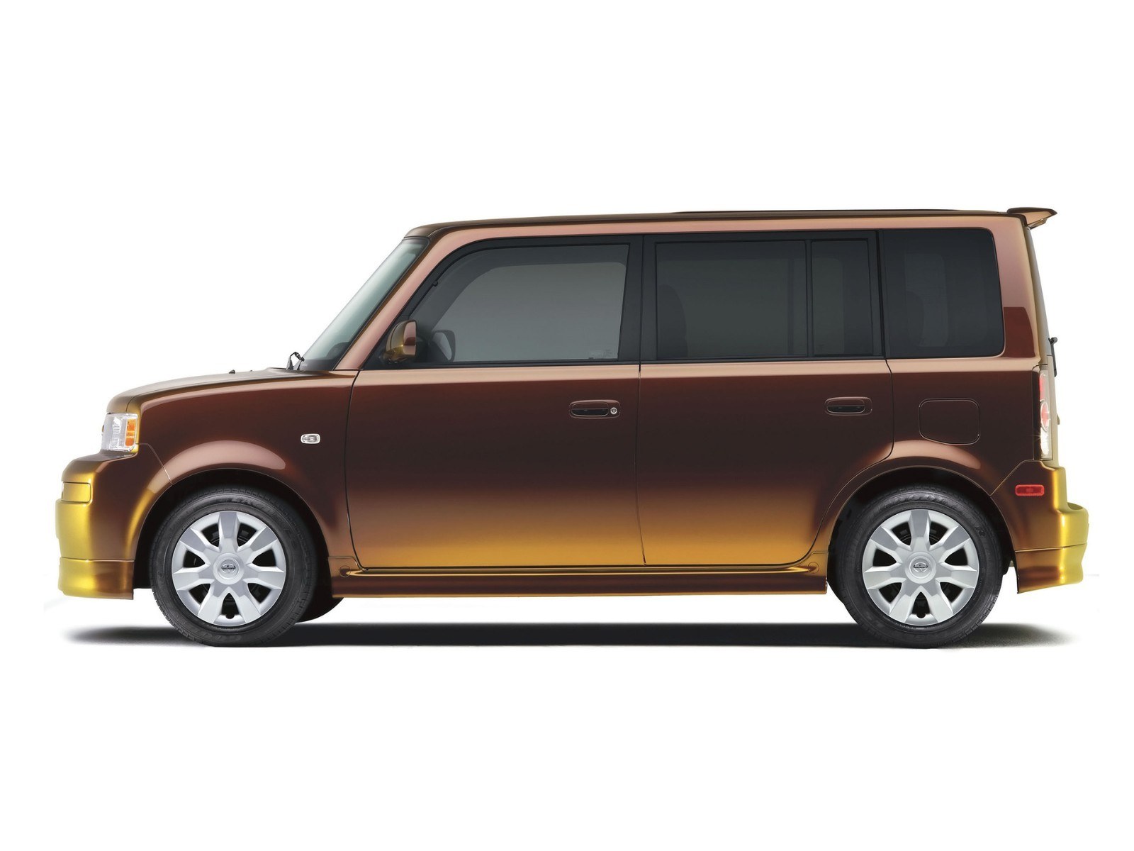 brown and gold compact car