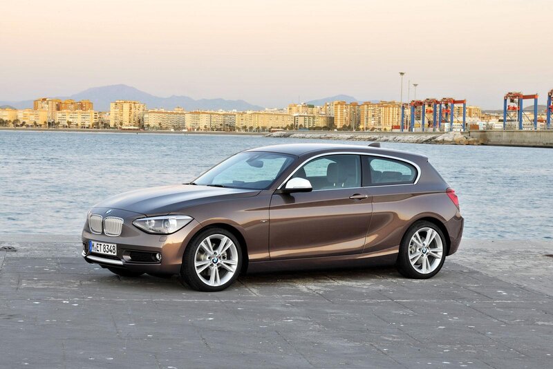 Brown BMW 1 Series by the sea