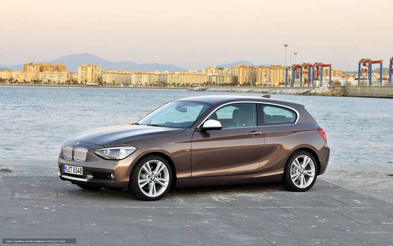 Brown BMW 1 Series by the sea