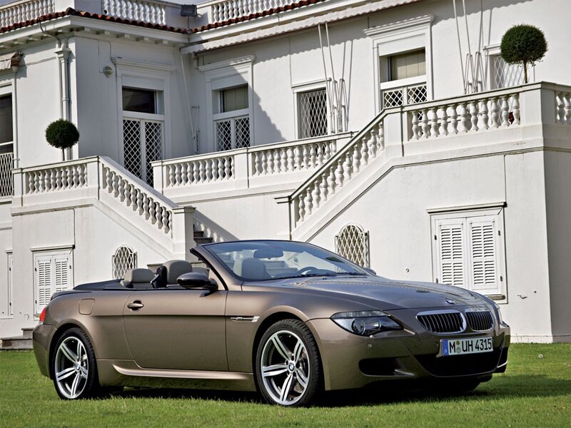 Brown BMW convertible on lawn