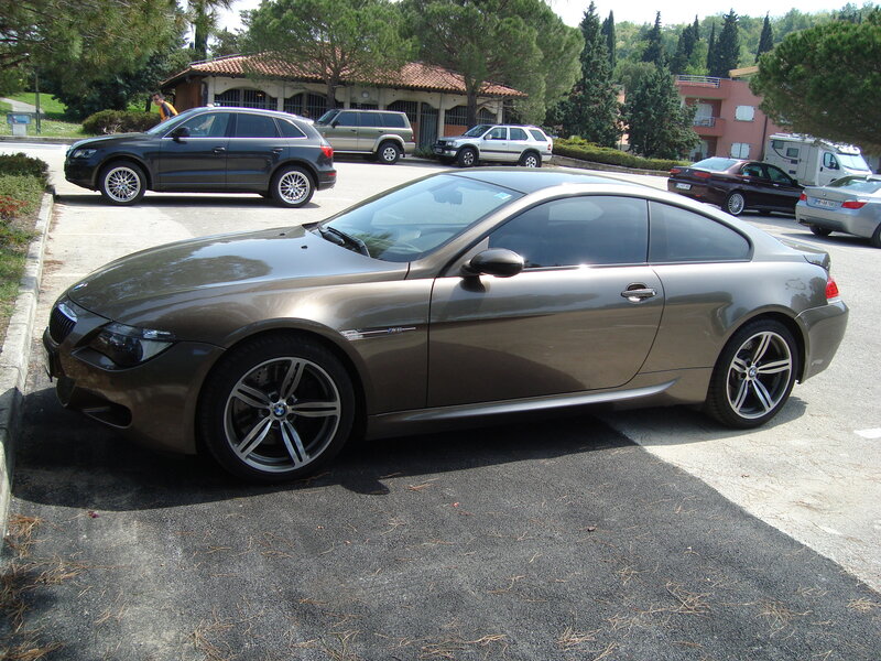 Brown BMW coupe parked