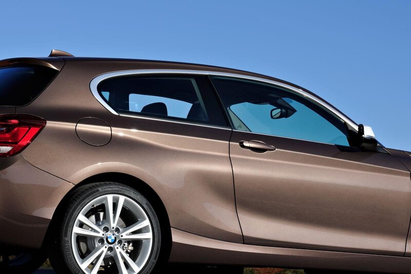 Brown BMW hatchback car