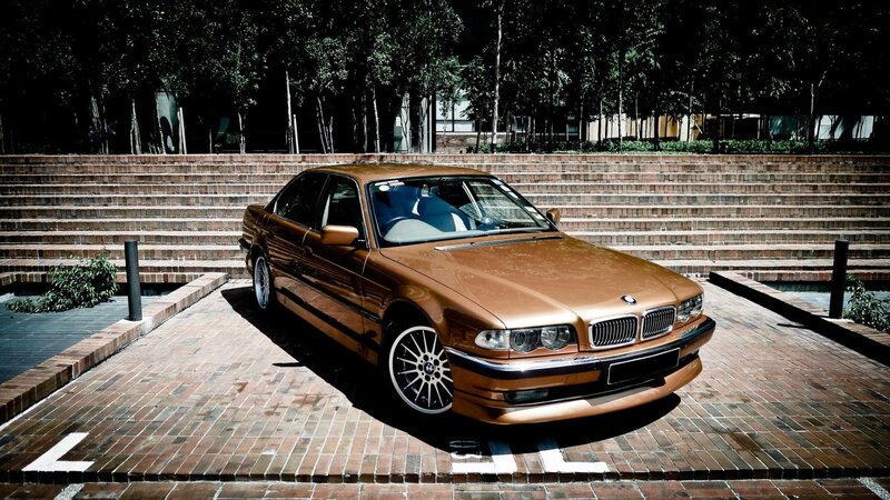Brown BMW Sedan — Dramatic, Afternoon
