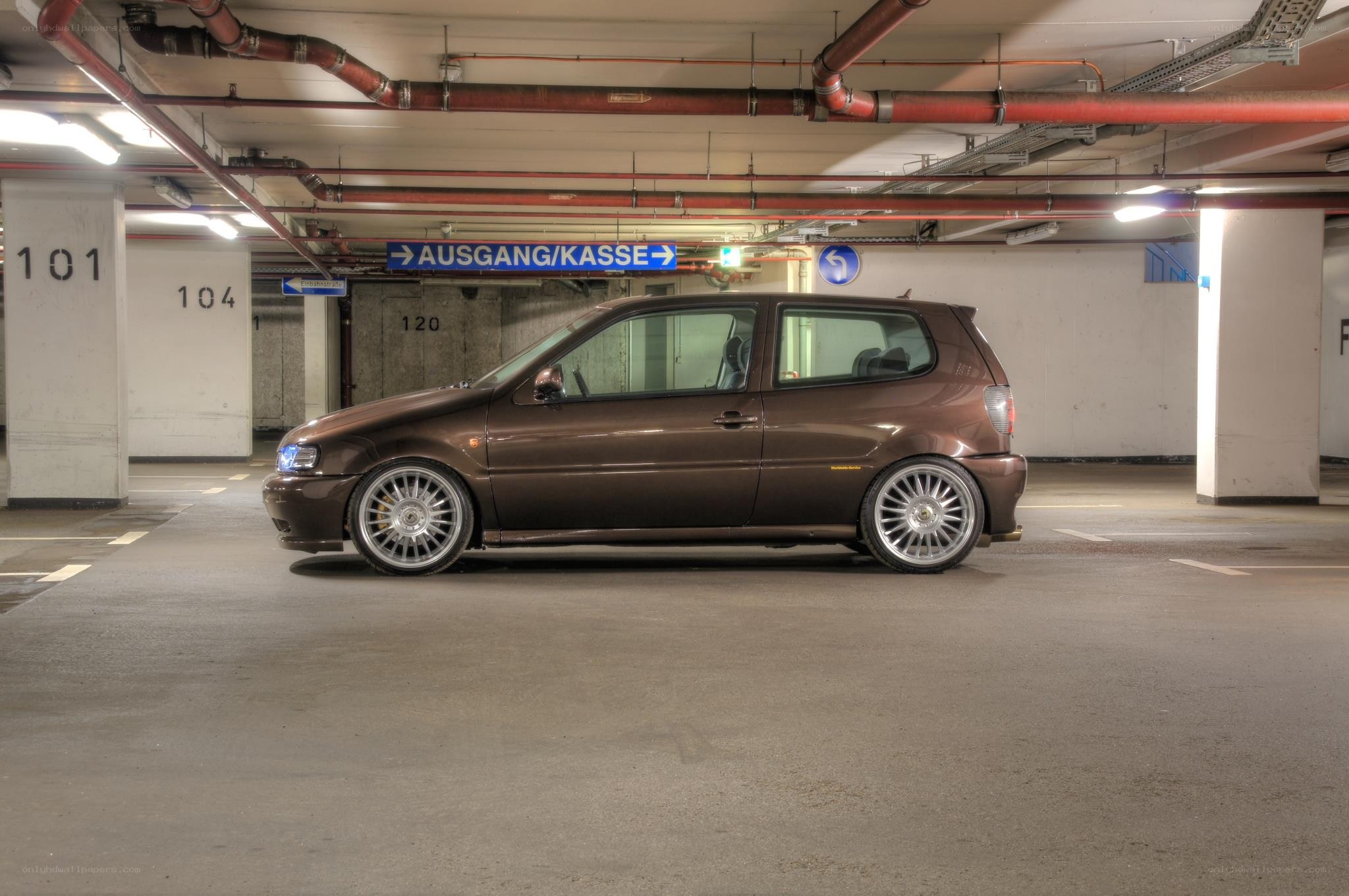 Brown car in parking garage