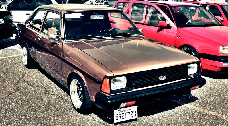 Brown classic car at a show
