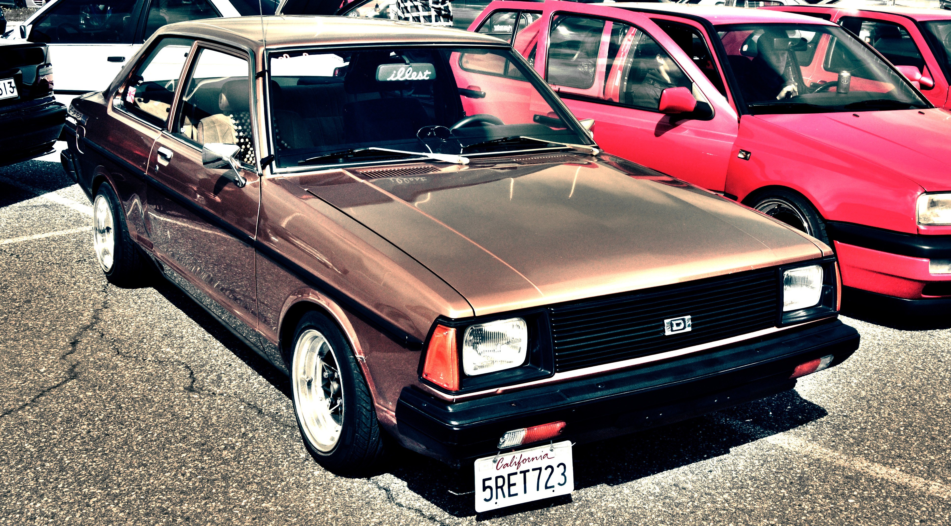 Brown classic car at a show