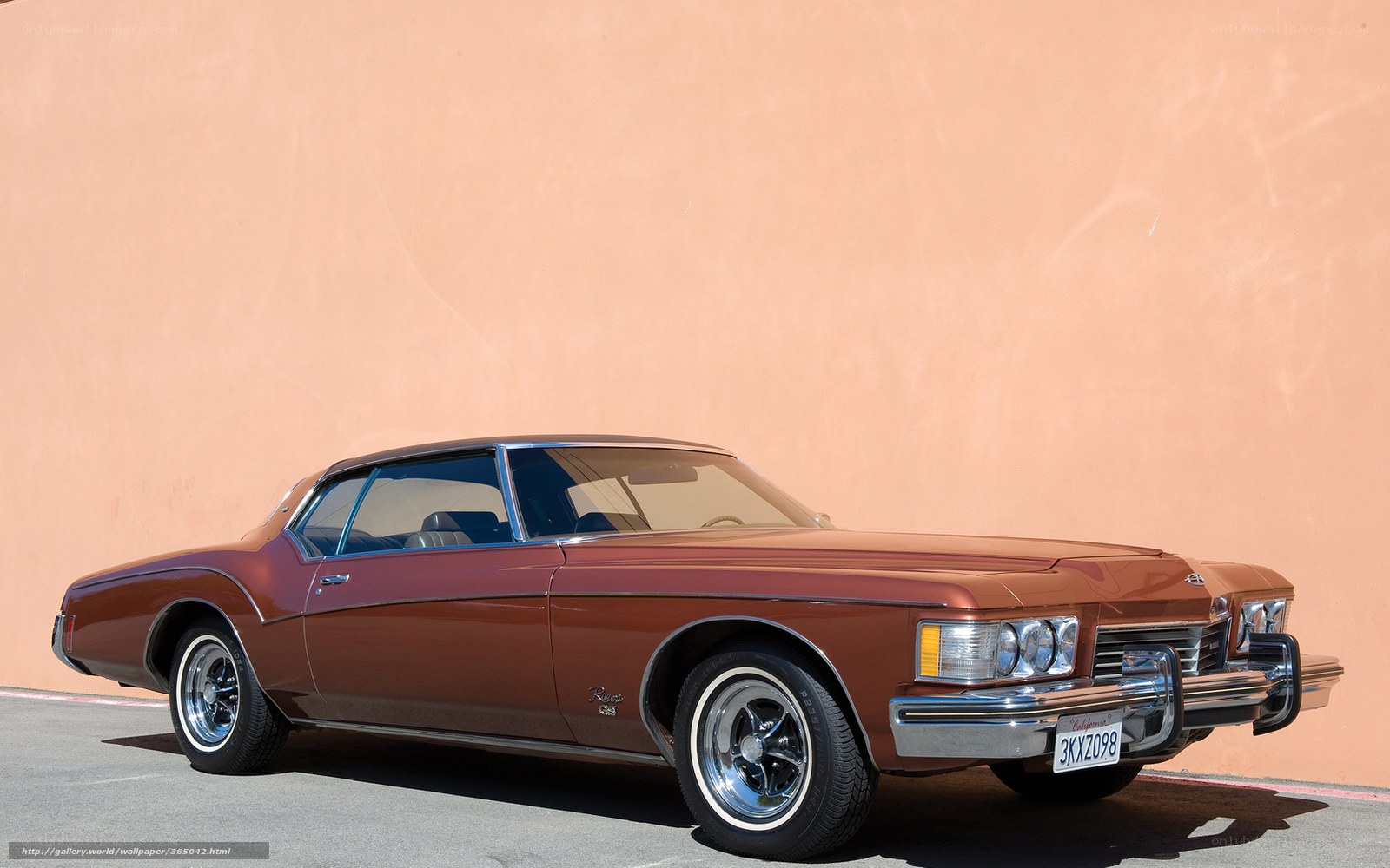 Brown classic car on street