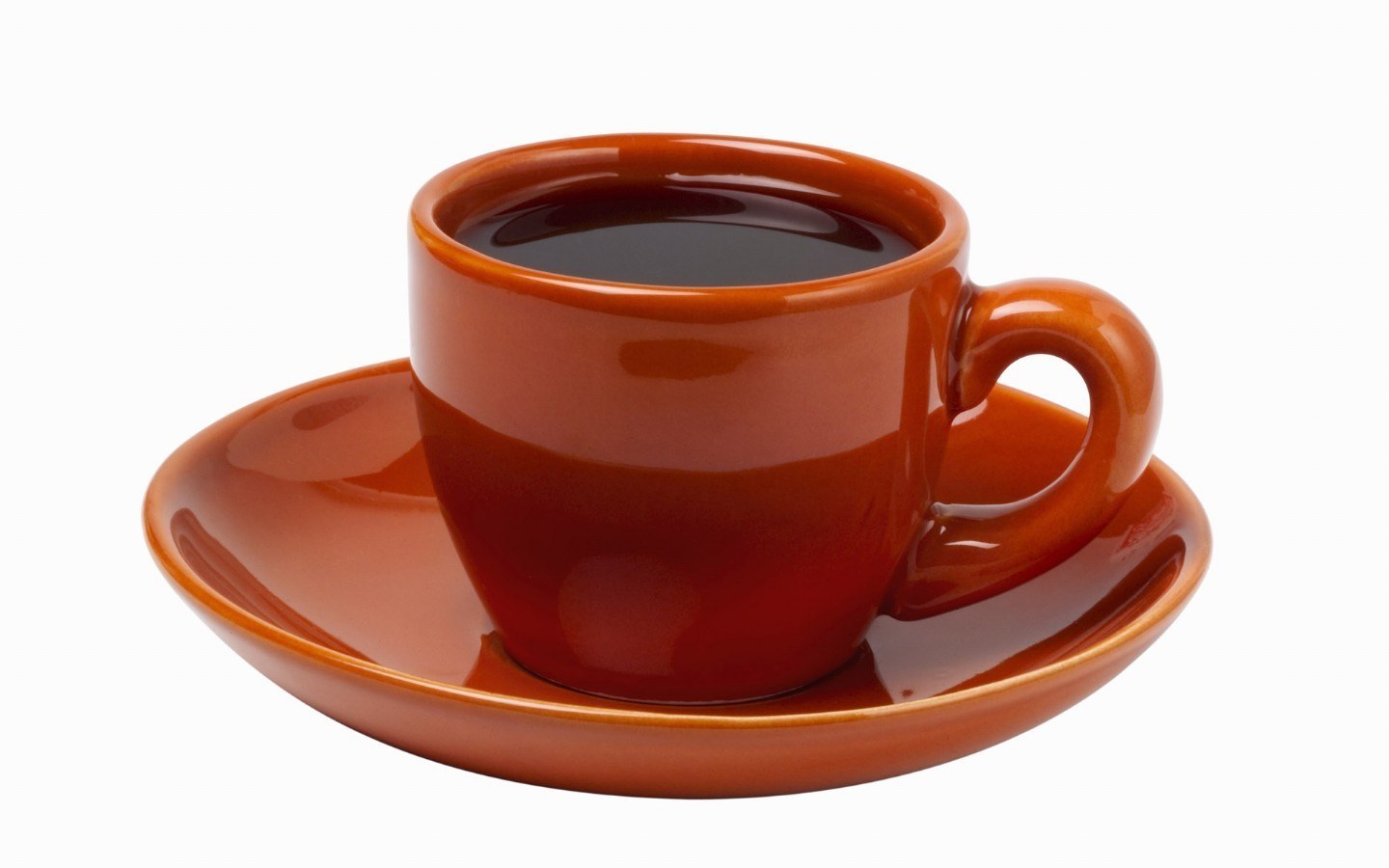 brown coffee cup on saucer