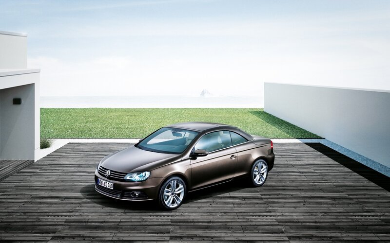 Brown convertible on wooden deck