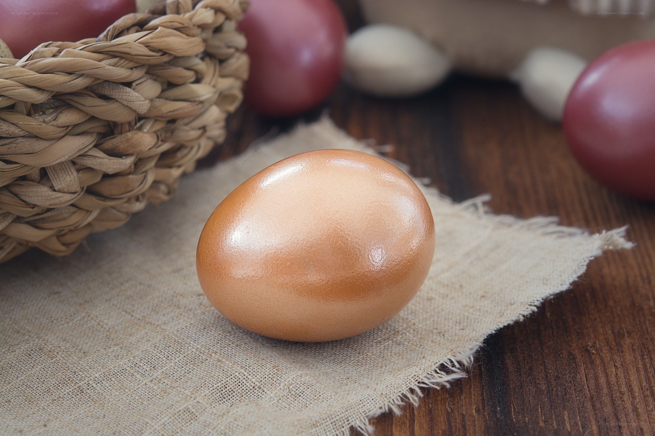 brown egg on burlap cloth