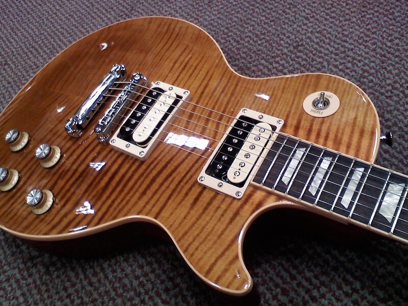 brown electric guitar